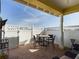 Brick patio with table, chairs, and seating area at 5516 Luminar Pointe Ln, Apollo Beach, FL 33572