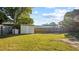 Backyard with shed and grassy area at 6208 10Th St, Zephyrhills, FL 33542