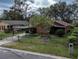 House with carport and yard, aerial view at 1005 S Empire St, Plant City, FL 33563