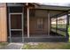 Screened porch with door and window at 1005 S Empire St, Plant City, FL 33563