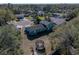 Aerial view of house, backyard, and neighborhood at 1008 Highgrove Ct, Valrico, FL 33596