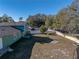 Large backyard with a pool and plenty of green space at 1008 Highgrove Ct, Valrico, FL 33596