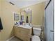 Bathroom with shower/tub combo, vanity, and toilet at 1008 Highgrove Ct, Valrico, FL 33596