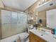 Bathroom with tub/shower combo and vanity at 1008 Highgrove Ct, Valrico, FL 33596