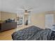 Primary bedroom with king bed and en-suite bathroom at 1008 Highgrove Ct, Valrico, FL 33596