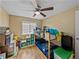 bedroom with bunk beds and built in storage at 1008 Highgrove Ct, Valrico, FL 33596