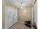 Bright entryway with tiled floor and double doors at 1008 Highgrove Ct, Valrico, FL 33596