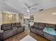 Open living room with hardwood floors and access to upper level at 1008 Highgrove Ct, Valrico, FL 33596