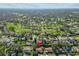 Aerial view of a house in a residential neighborhood near a golf course at 1813 Laurel Oak Dr, Valrico, FL 33596