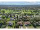 House in a residential neighborhood near a golf course at 1813 Laurel Oak Dr, Valrico, FL 33596
