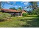 Home with a screened-in patio and spacious backyard at 1813 Laurel Oak Dr, Valrico, FL 33596