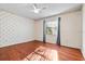 Spacious bedroom with hardwood floors and window at 1813 Laurel Oak Dr, Valrico, FL 33596