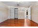 Hardwood floor bedroom with double door closet at 1813 Laurel Oak Dr, Valrico, FL 33596