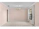 Elegant dining room with neutral walls and carpeting at 1813 Laurel Oak Dr, Valrico, FL 33596