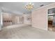 Spacious living room with large windows and a view of the backyard at 1813 Laurel Oak Dr, Valrico, FL 33596