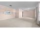 Bright living room featuring hardwood floors and a chandelier at 1813 Laurel Oak Dr, Valrico, FL 33596