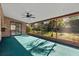 Spacious screened porch with a view of the backyard at 1813 Laurel Oak Dr, Valrico, FL 33596