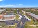 Condo building with covered parking and gated entrance at 3055 Casa Del Sol Cir # 208, Clearwater, FL 33761