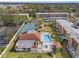 Condo community with pool, tennis court, and lush landscaping at 3055 Casa Del Sol Cir # 208, Clearwater, FL 33761