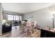 Simple dining area with table and chairs and access to balcony at 3055 Casa Del Sol Cir # 208, Clearwater, FL 33761