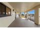 Condo hallway with light-colored walls and balcony access at 3055 Casa Del Sol Cir # 208, Clearwater, FL 33761