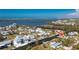 Property's aerial view showing location on a canal at 10436 Raymond St, Englewood, FL 34224