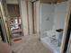 Unfinished bathroom with new shower and toilet installation at 10436 Raymond St, Englewood, FL 34224