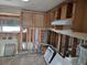 Unfinished kitchen with new cabinets and sink installation at 10436 Raymond St, Englewood, FL 34224