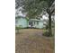 Ranch style home with a large front yard and mature trees at 2700 9Th N Ave, St Petersburg, FL 33713