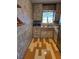 Kitchen features laminate countertops and wood flooring at 2700 9Th N Ave, St Petersburg, FL 33713