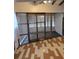 Bright sunroom with glass panels and wood flooring at 2700 9Th N Ave, St Petersburg, FL 33713