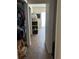 Hallway with closet and view into another room at 1371 Sea Gull S Dr, St Petersburg, FL 33707