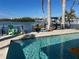 Large pool with patio and waterfront views at 1371 Sea Gull S Dr, St Petersburg, FL 33707