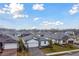 Community of single-Gathering homes with gray roofs and landscaped yards at 5213 Patano Loop, Palmetto, FL 34221