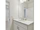 Clean bathroom with white vanity and quartz countertop at 5213 Patano Loop, Palmetto, FL 34221