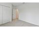 Spacious bedroom with double door closet and grey carpet at 5213 Patano Loop, Palmetto, FL 34221