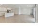Open living space with tile floors and access to kitchen at 5213 Patano Loop, Palmetto, FL 34221