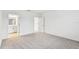 Spacious bedroom with grey carpet and en-suite bathroom at 5217 Patano Loop, Palmetto, FL 34221