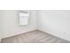 Well-lit bedroom with grey carpet and window with blinds at 5217 Patano Loop, Palmetto, FL 34221