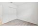 Spacious bedroom featuring grey carpet and a double-door closet at 5217 Patano Loop, Palmetto, FL 34221