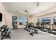 State-of-the-art fitness center includes various equipment and large windows at 18053 Cherished Loop, Bradenton, FL 34211