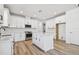 Bright kitchen featuring white cabinets and stainless steel appliances at 18053 Cherished Loop, Bradenton, FL 34211