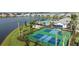 Enjoy the two pickleball courts nestled by the lake at 18053 Cherished Loop, Bradenton, FL 34211