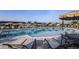 Expansive pool area with comfortable seating and shade at 18053 Cherished Loop, Bradenton, FL 34211