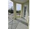 Private balcony with access from bedroom, offering an outdoor space at 3426 79Th Street W Cir # 7-203, Bradenton, FL 34209