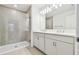 Bathroom boasts double vanity and a glass shower at 5410 Tripoli Dr, Palmetto, FL 34221