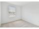 Well-lit bedroom featuring carpet flooring and window blinds at 5410 Tripoli Dr, Palmetto, FL 34221