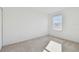 Light-filled bedroom with window and carpet flooring at 5426 Tripoli Dr, Palmetto, FL 34221