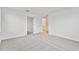 Bright bedroom with grey carpet and access to bathroom at 5429 Tripoli Dr, Palmetto, FL 34221