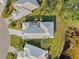 Aerial view of home and surrounding landscape at 750 Pond Lily Way, Venice, FL 34293